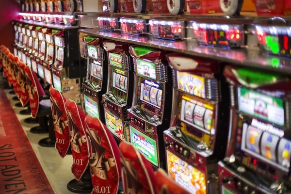 Review the paytable before playing Paytable view showing Ikan Hoki symbol values and payouts